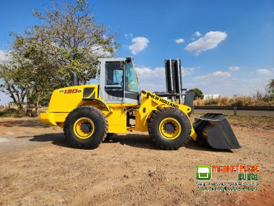 PÁ CARREGADEIRA W130 NEW HOLLAND ANO 2009